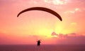 Flight of paraplane above Mediterranean sea