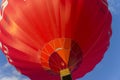 Flight in a red basket balloon against the blue sky Royalty Free Stock Photo