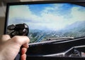 Flight simulator game and hand on joystick