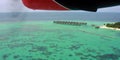 Aerial view of Maafushivaru atoll from seaplane, Maldives