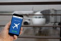 Flight on time notification on Smartphone announces good news to tourist