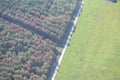 Aero view of a tractor bailing hay in Oklahoma Royalty Free Stock Photo