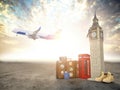 Flight to London, Great Britain.Vintage suiitcase with symbols of UK London, Big Ben and red booth. Travel and tourism concept Royalty Free Stock Photo