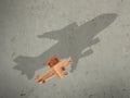 The flight wood airplane with the shadow plane Royalty Free Stock Photo