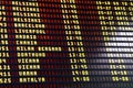 Flights information board in airport terminal