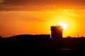 Flights management air control tower at the airport at dawn or sunrise. Summer travel concept