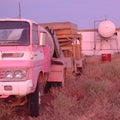 Pink truck parked in the outback