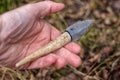 Flint knife - stone age tool leaf blade in deer antler Royalty Free Stock Photo