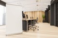 Flip chart standing on wooden floor in the panoramic office space Royalty Free Stock Photo