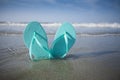 Flip Flop Sandals in the Sand at the Beach Royalty Free Stock Photo