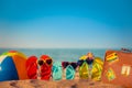 Flip-flops, beach ball and suitcase Royalty Free Stock Photo