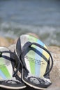 Flip-flops on the beach Royalty Free Stock Photo