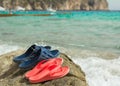 Flip flops on beach rock Royalty Free Stock Photo