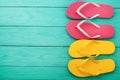 Flip flops on blue wooden background with copy space. Beach accessories. Top view. Mock up. Summer shoes sandals. Slippers Royalty Free Stock Photo