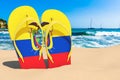 Flip flops with Ecuadorian flag on the beach. Ecuador resorts, vacation, tours, travel packages concept. 3D rendering