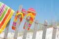 Flip flops on fence Royalty Free Stock Photo