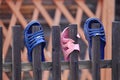 Flip flops on the fence Royalty Free Stock Photo