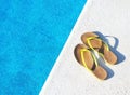 Flip Flops on the pool Royalty Free Stock Photo