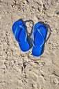 Flip-flops on the sand. Royalty Free Stock Photo