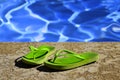 Flip Flops Sandals by Swimming Pool Royalty Free Stock Photo