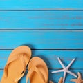 Flip flops star fish summer seashore blue wood background border Royalty Free Stock Photo