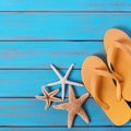 Flip flops starfish bright blue beach wood tropical caribbean background Royalty Free Stock Photo