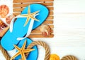 Flip-flops, starfish and seashells. Royalty Free Stock Photo