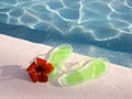 Flip-flops at swimming pool Royalty Free Stock Photo