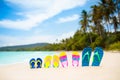 Flip flops on tropical beach. Vacation footwear Royalty Free Stock Photo
