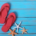 Flipflops starfish summer beach blue wood background square Royalty Free Stock Photo