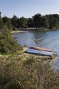 Flipped boat on a coast Royalty Free Stock Photo