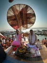 Flipped vertical shot of priests at Dashashwamedh Ghat Varanasi on the Magh Purnima eve in India