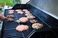 Flipping Burgers on a Grill