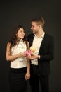 Flirting and dating. Love and romance. Gift with love. Couple on romantic date. Formal couple with toy. Man and woman