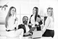 Flirting and seduction. Secretary and manager. Office affair. Flirting with boss. Surrounded by beautiful ladies. Man Royalty Free Stock Photo