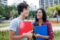 Flirting student couple on campus Royalty Free Stock Photo