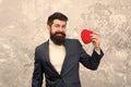 Flirting with you. Feast of Saint Valentine. Generous man. Handsome man hold red heart. Businessman formal outfit love