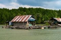 Float fishing village on tropical river Royalty Free Stock Photo