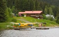 A float plane secured to a wooden jetty in alaska Royalty Free Stock Photo