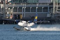 Float Plane taking off in Vancouver, Canada. Royalty Free Stock Photo