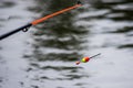 Float on the water with a fishing line Royalty Free Stock Photo