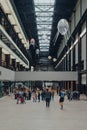 Floating aerobes in Anicka Yi`s installation In Love With The World in Turbine Hall of Tate Modern museum in London, UK Royalty Free Stock Photo