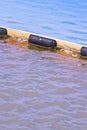 Floating anti-pollution barrier made with modular plastic elements - image with copy space Royalty Free Stock Photo
