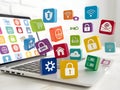 Floating App Icons on Laptop Display for Web Development Royalty Free Stock Photo