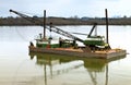 Floating barge and heavy duty crane, Oregon. Royalty Free Stock Photo