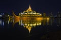 Floating Barge Karaweik Hall on Kandawgyi lake at twilight