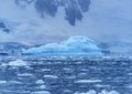 Floating Blue Iceberg Snow Mountains Paradise Bay Skintorp Cove Antarctica Royalty Free Stock Photo
