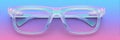 Floating Blue-Light Glasses Showcase Modern Technology Against a Digital Gradient Background in a Clean Tech Style Royalty Free Stock Photo
