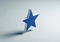 Floating blue star with a white 3D outline against a light gray background. The star is Royalty Free Stock Photo