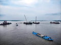Floating boat carrying sand in river way named jamuna Royalty Free Stock Photo